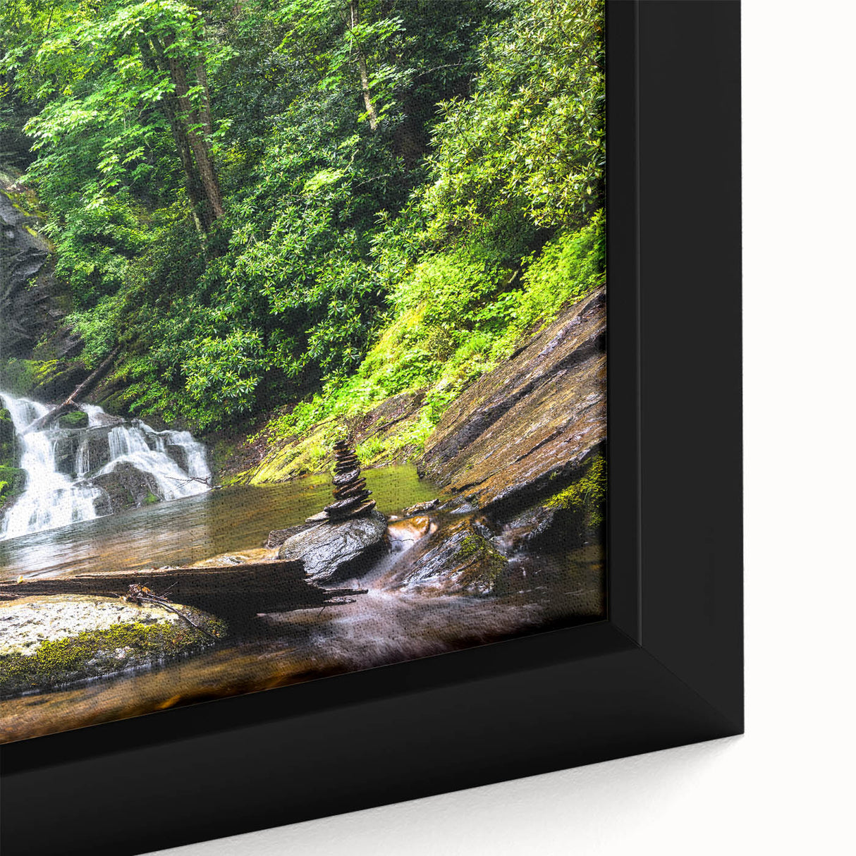 Framed canvas wall art showcasing a serene waterfall landscape with vibrant colors and intricate details, ideal for home decor enthusiasts looking to enhance their space.
