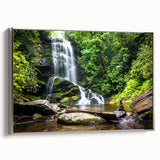 Framed canvas wall art showcasing a serene landscape waterfall, elegantly bordered in silver, perfect for home decor and nature lovers. Ideal for enhancing interior spaces.