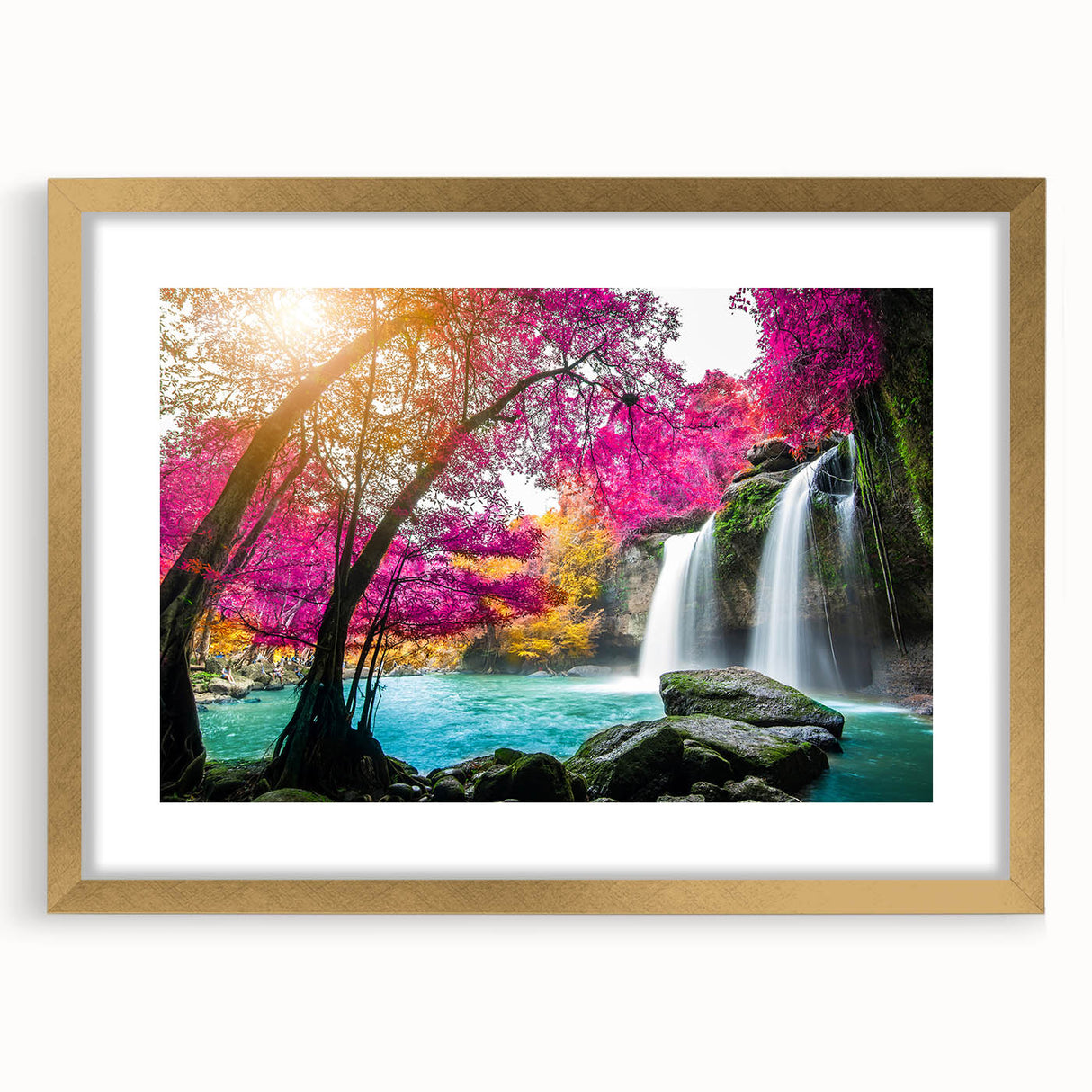 Framed wall art showcasing a serene waterfall landscape, featuring vibrant greens and calming blues, with a gold mat and frame for an elegant touch. Ideal for enhancing home decor and creating a tranquil atmosphere.