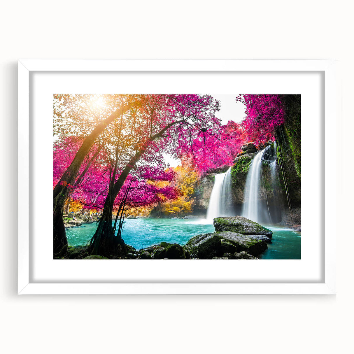 Framed landscape wall art featuring a serene waterfall scene with lush greenery and vibrant colors, elegantly presented in a white mat for a modern touch. Ideal for home decor to enhance living spaces with nature-inspired aesthetics.
