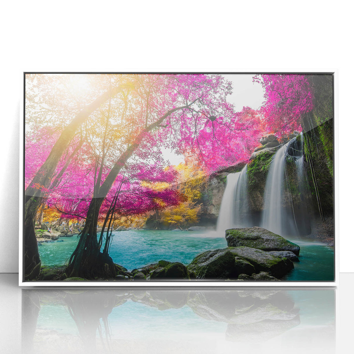Framed wall art collection showcasing a serene waterfall landscape design in vibrant blues and greens, set against a sleek white acrylic frame for modern decor. Perfect for adding a tranquil touch to living spaces or offices.