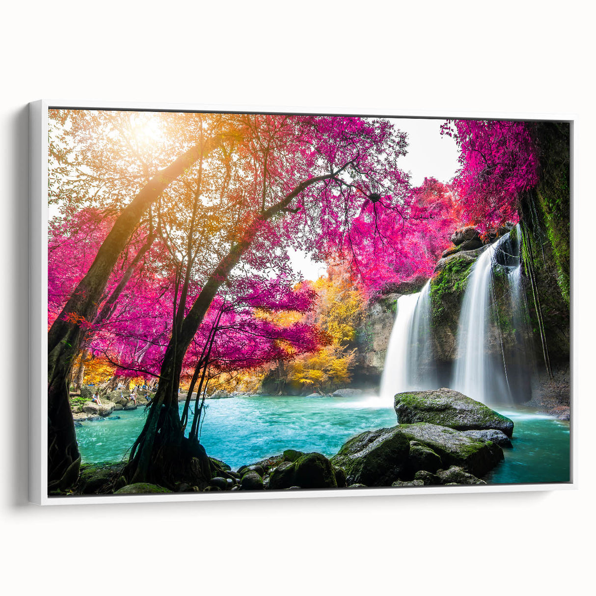 Framed canvas wall art showcasing a serene waterfall landscape design with vibrant blues and greens, ideal for enhancing home decor and creating a tranquil atmosphere.