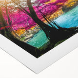 A vibrant rolled canvas artwork depicting a serene landscape with cascading waterfalls, lush greenery, and a tranquil blue sky, ideal for home decor and nature enthusiasts.