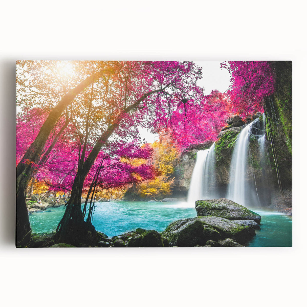 Stretched canvas artwork showcasing a serene waterfall landscape surrounded by lush greenery, perfect for enhancing home decor with nature-themed elegance.