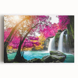 Stretched canvas artwork showcasing a serene waterfall landscape surrounded by lush greenery, perfect for enhancing home decor with nature-themed elegance.