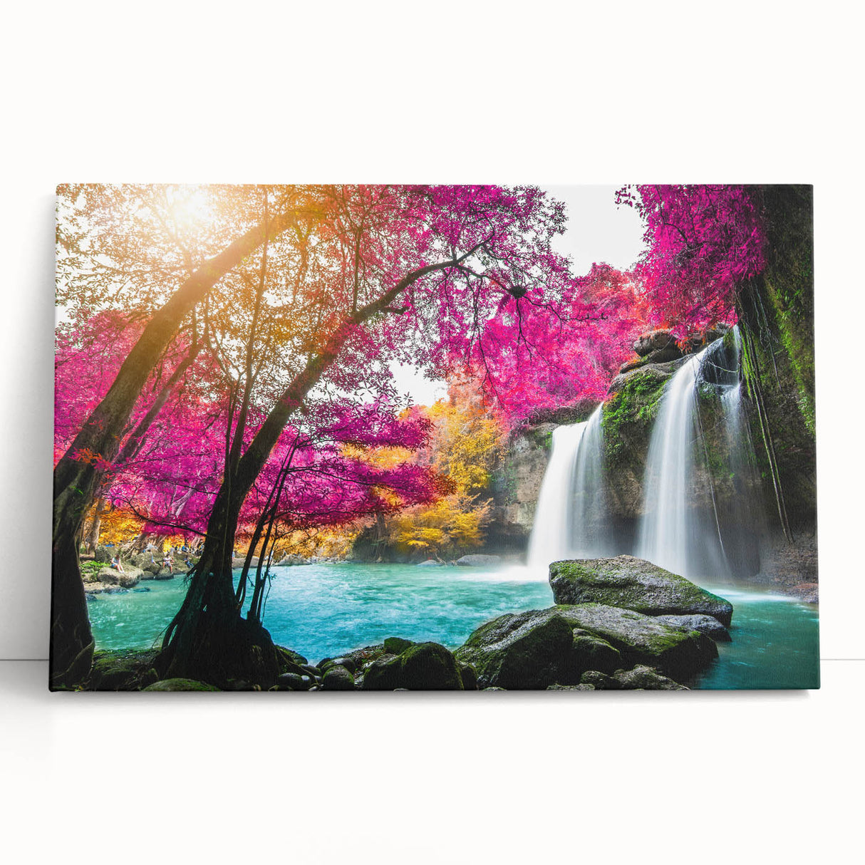 Stretched canvas wall art depicting a vibrant waterfall landscape, showcasing lush greenery and flowing water, perfect for home decor and nature lovers.