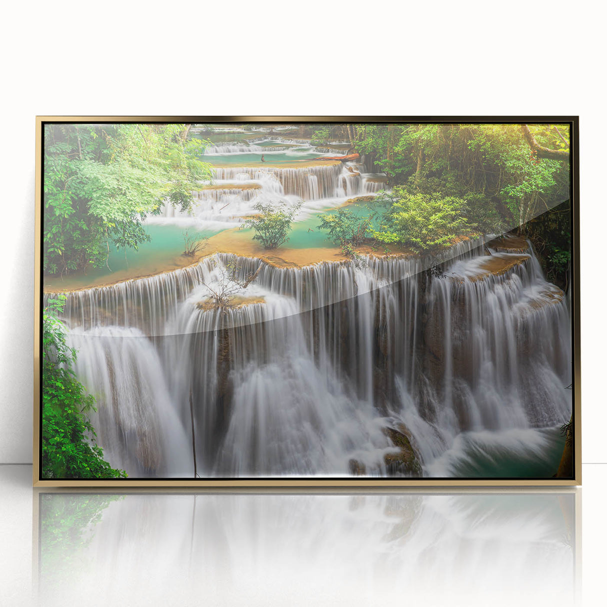 Framed acrylic wall art featuring a stunning waterfall landscape design in a gold frame, perfect for adding elegance to home decor. Ideal for nature lovers.