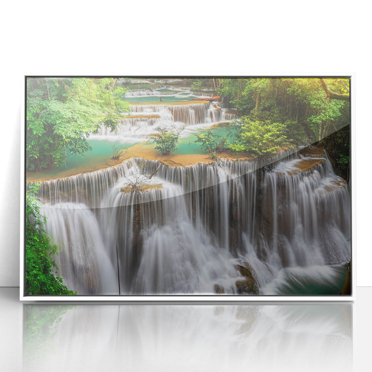 Framed acrylic wall art collection featuring a serene waterfall landscape design, set in a sleek white frame, perfect for modern home decor and nature enthusiasts.