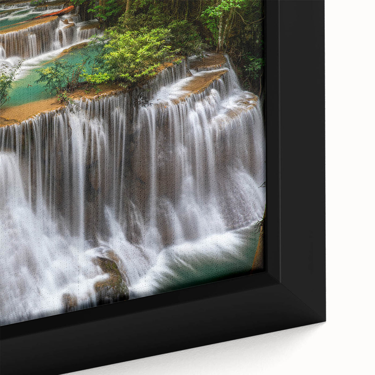 Framed canvas wall art showcasing a vibrant waterfall landscape design, highlighting intricate details and rich colors, perfect for enhancing home decor.