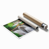 Stunning rolled print of a serene landscape waterfall, showcasing vibrant blues and greens, ideal for home decor, packaged securely in a cardboard tube.
