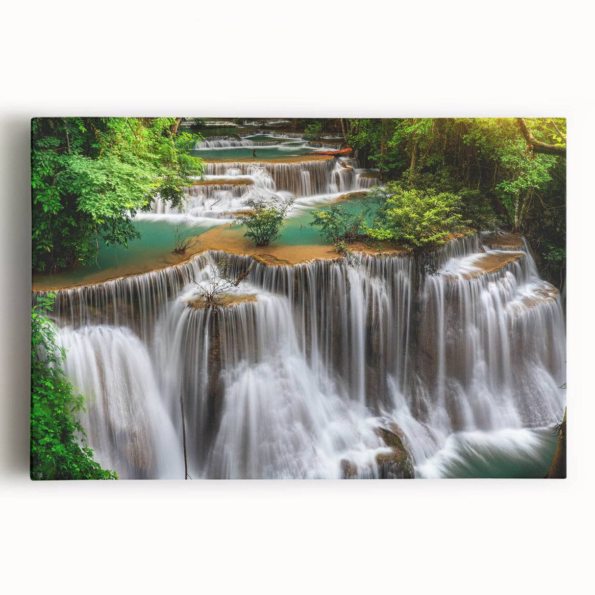 Stretched canvas artwork showcasing a stunning waterfall landscape with vibrant colors and intricate details, perfect for home decor and nature enthusiasts.