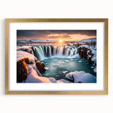 Framed wall art showcasing a serene waterfall landscape, featuring vibrant green foliage and cascading water, presented in a gold frame with a white mat. Ideal for nature enthusiasts and home decor.
