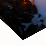 Close-up of a vibrant, stretched canvas wall art featuring a serene waterfall landscape with lush greenery, perfect for home decor and nature enthusiasts.