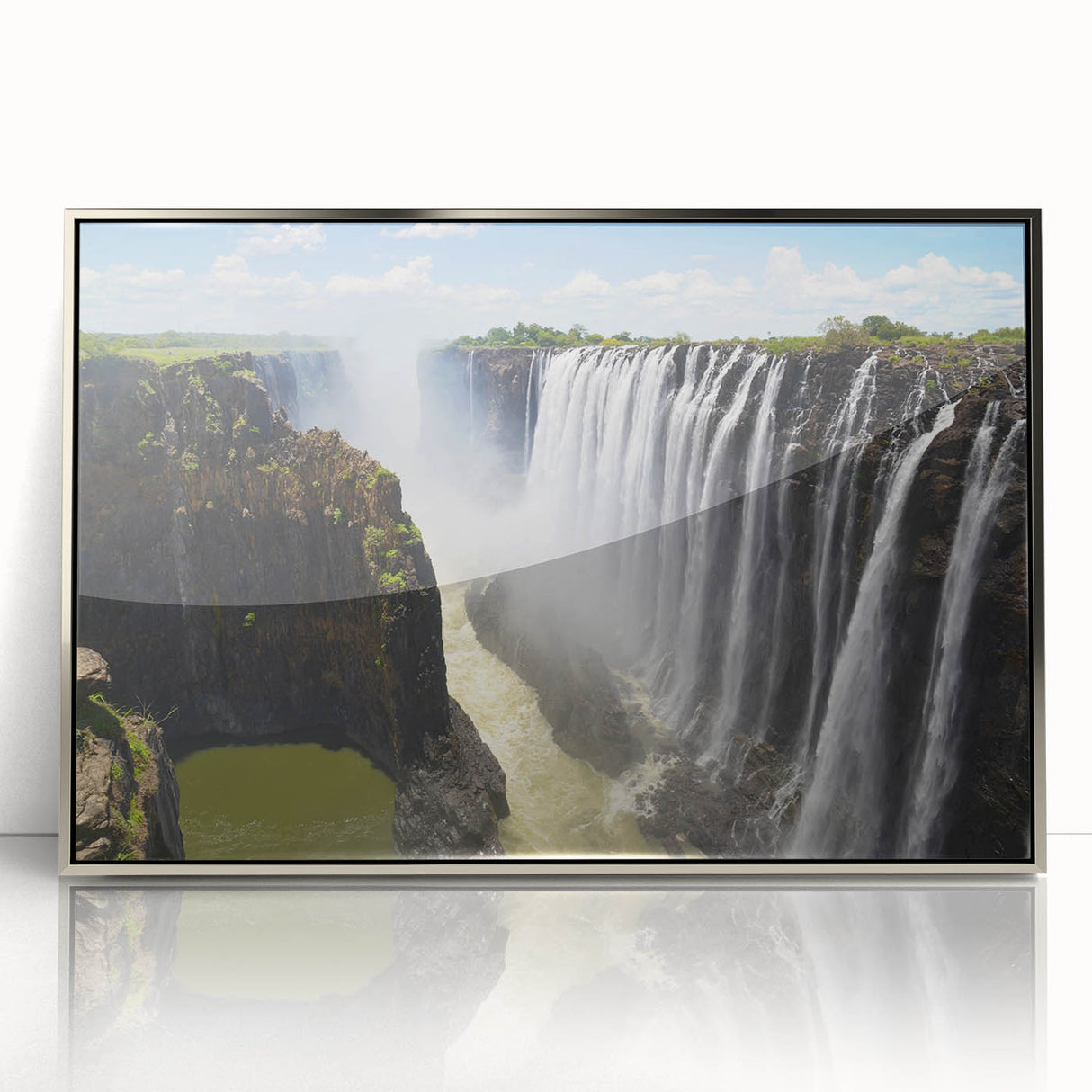 Framed acrylic wall art showcasing a serene waterfall landscape in silver tones, perfect for modern home decor, emphasizing tranquility and nature's beauty.