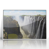 Framed wall art featuring a serene waterfall landscape design in vibrant colors, set in a sleek white frame, perfect for enhancing home decor.