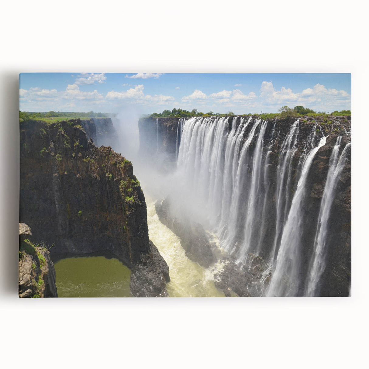 Stretched canvas wall art showcasing a vibrant waterfall landscape design with lush greenery and cascading water, ideal for home decor and nature lovers.