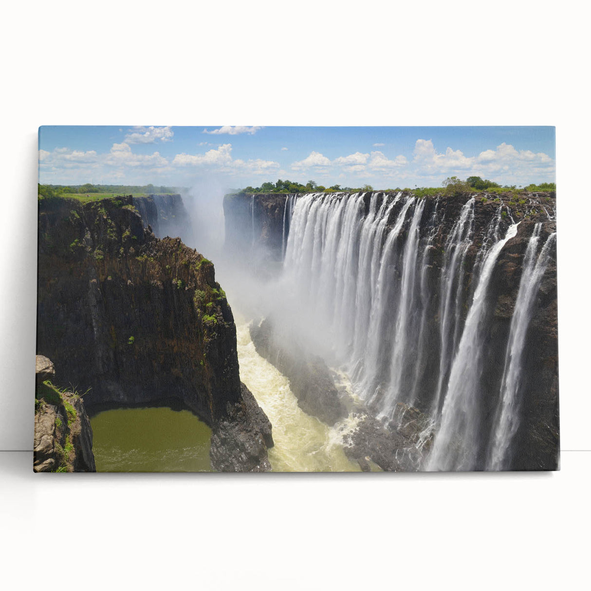 Stretched canvas wall art featuring a serene waterfall landscape design, showcasing vibrant blues and greens, ideal for home decor and nature enthusiasts.