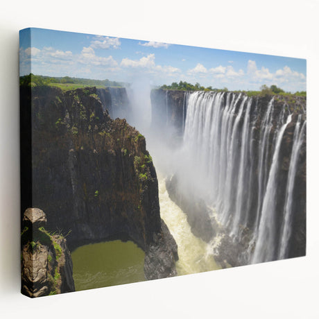 Stretched canvas wall art featuring a serene waterfall landscape design, showcasing vibrant blues and greens, perfect for adding tranquility to any room decor.
