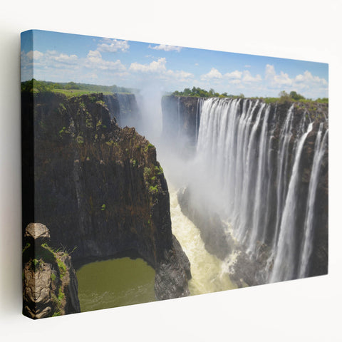 Stretched canvas wall art featuring a serene waterfall landscape design, showcasing vibrant blues and greens, perfect for adding tranquility to any room decor.