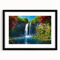 Framed wall art featuring a vibrant waterfall landscape design, accented with a black mat, showcasing a serene and calming nature scene ideal for home decor.