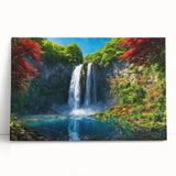 Vibrant canvas artwork showcasing a stunning waterfall landscape, perfect for home decor. The piece features rich blues and greens, evoking tranquility and nature's beauty.