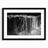 Framed wall art featuring a stunning waterfall landscape design, showcasing vibrant blues and greens, set against a sleek black frame with a mat, ideal for home decor.