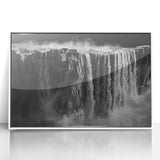 Framed acrylic wall art featuring a serene waterfall landscape design, presented in a sleek white frame. Ideal for enhancing modern home decor with nature-inspired aesthetics.