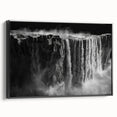 Framed canvas wall art showcasing a serene waterfall landscape, featuring vibrant colors and intricate details, with a sleek black frame enhancing its modern aesthetic. Ideal for home decor, this piece brings tranquility and natural beauty to any space.