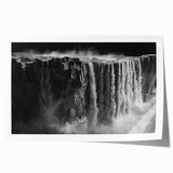 Vibrant rolled print showcasing a serene waterfall landscape with lush greenery, perfect for home decor or office spaces, beautifully packaged for protection.