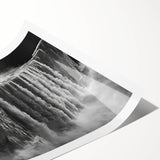 Vibrant rolled print depicting a serene landscape with cascading waterfalls and lush greenery, ideal for enhancing home decor with natural beauty.