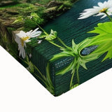 Close-up of a vibrant stretched canvas wall art featuring a stunning waterfall landscape design, showcasing rich colors and intricate details, ideal for home decor.