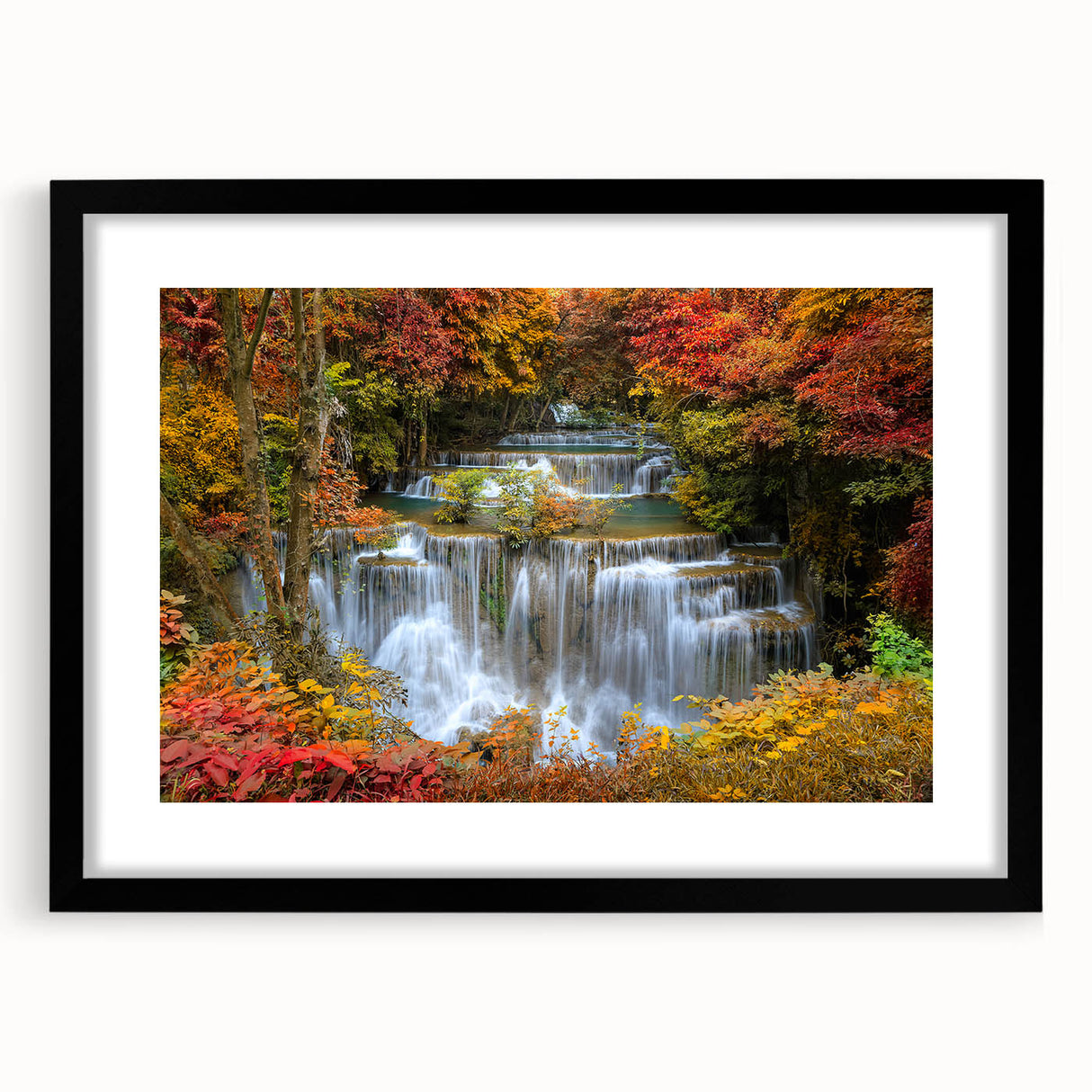 Framed black wall art showcasing a serene landscape waterfall scene with vibrant colors and intricate details, perfect for enhancing home decor.