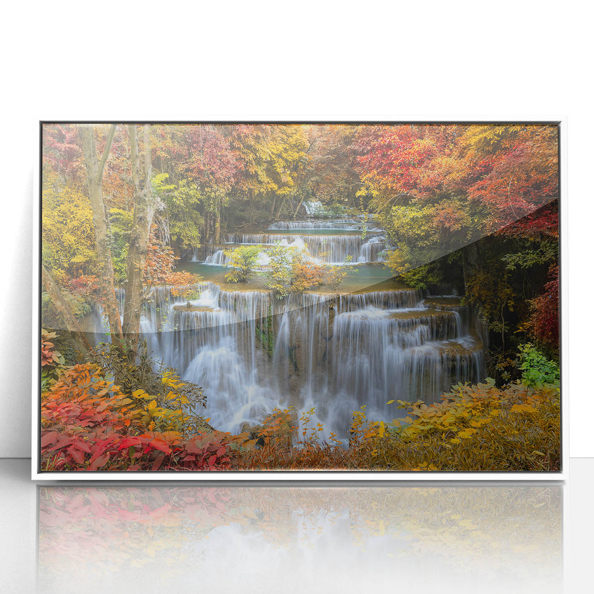 Framed acrylic wall art showcasing a serene waterfall landscape design, featuring vibrant blues and greens, ideal for home decor enhancement.