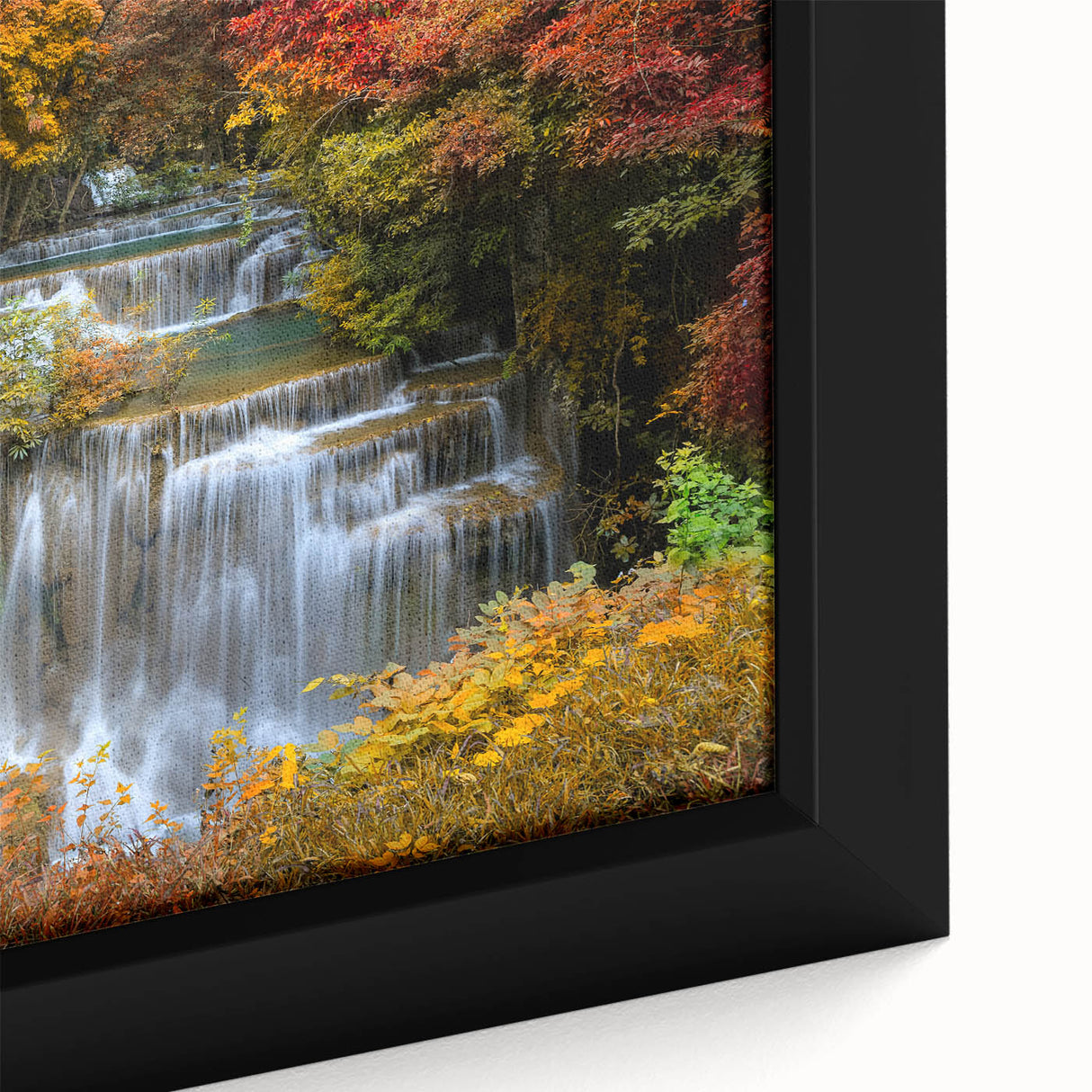 Framed canvas close-up of a vibrant waterfall landscape design, showcasing intricate details and colors, ideal for enhancing home decor with nature's beauty.