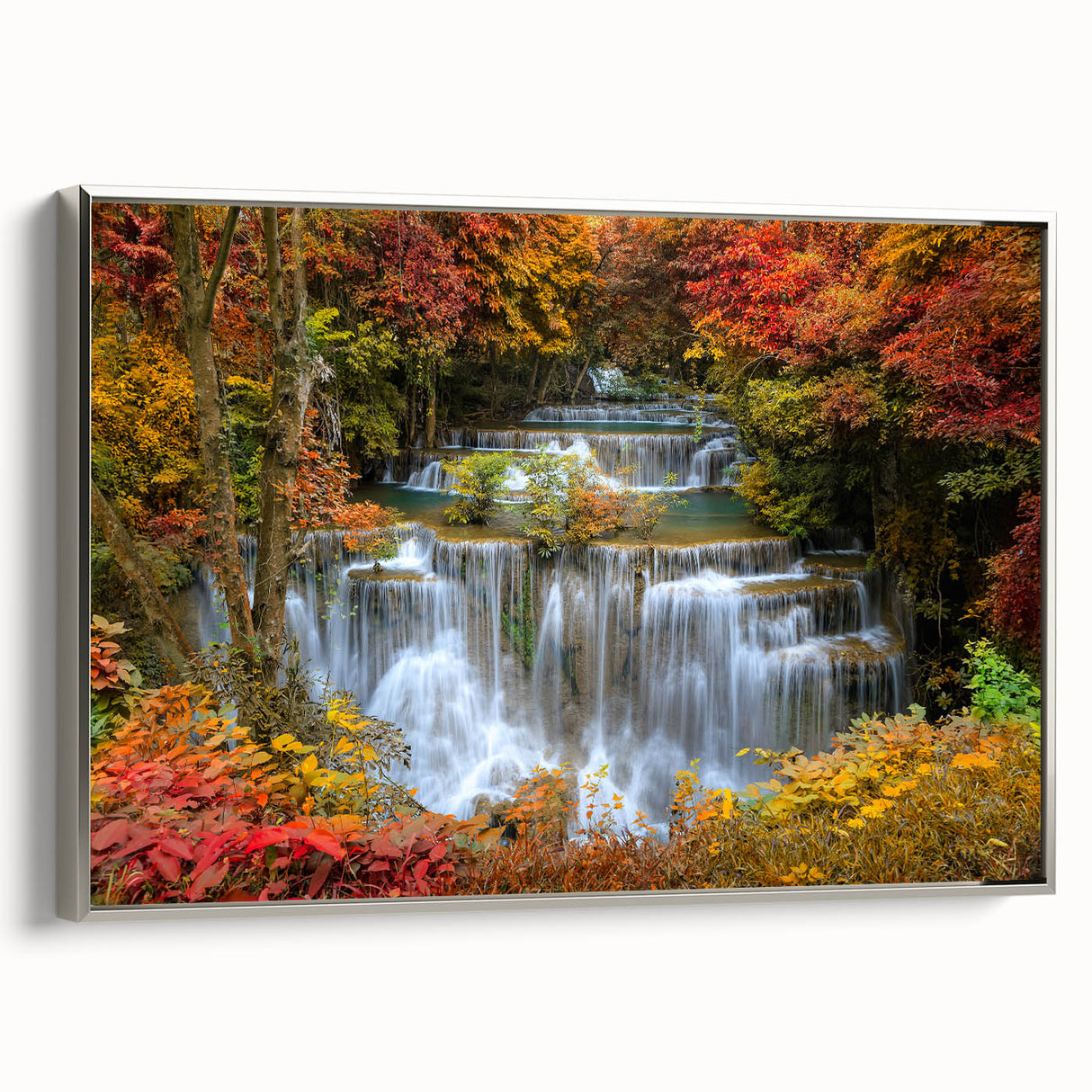 Framed canvas wall art showcasing a serene waterfall landscape design with silver accents, perfect for enhancing home decor with nature's beauty.