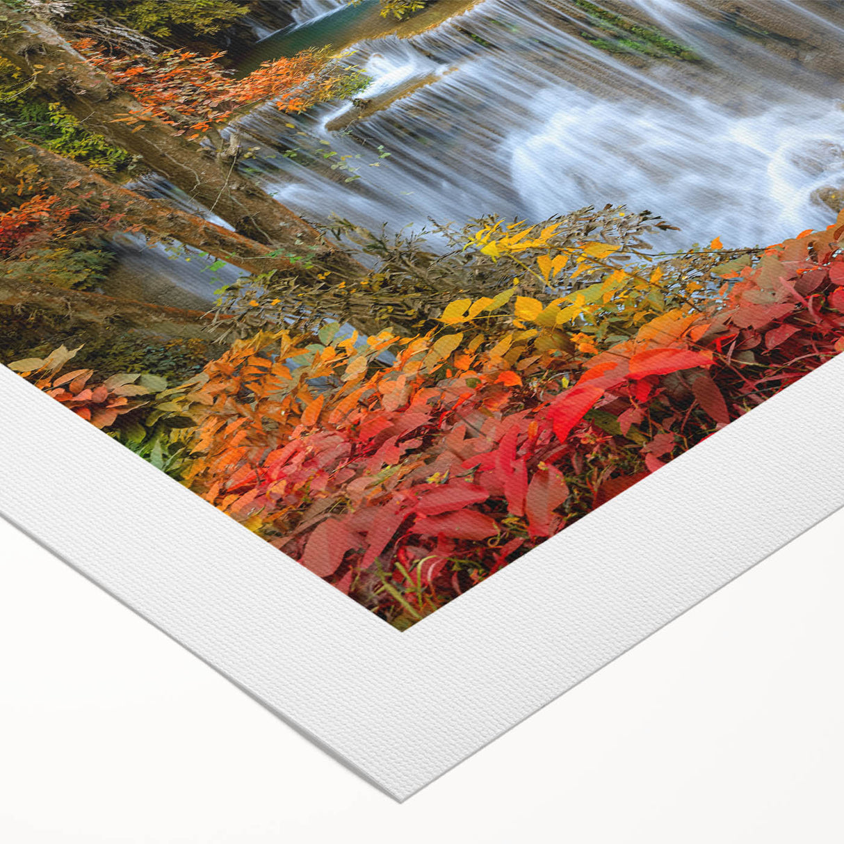 Vibrant canvas print showcasing a stunning waterfall landscape, featuring lush greenery and cascading water, perfect for home decor. Ideal for nature lovers.