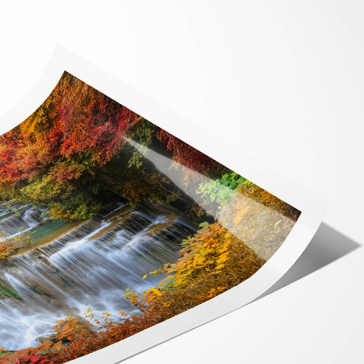 Vibrant waterfall landscape wall art print showcasing cascading water surrounded by lush greenery, perfect for home decor and nature lovers, rolled for easy framing.