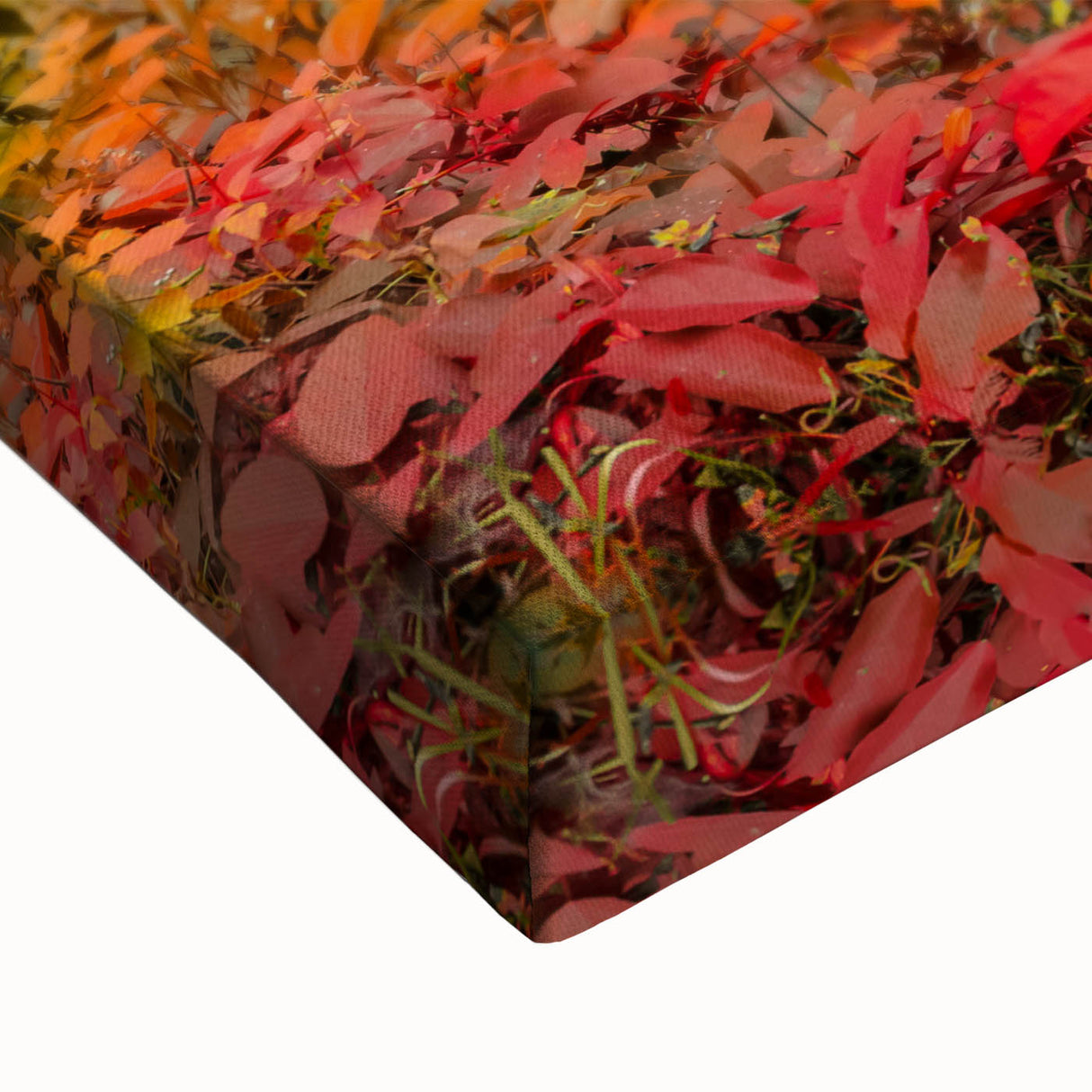 Close-up of a vibrant stretched canvas artwork showcasing a stunning waterfall landscape with lush greenery, perfect for home decor and nature lovers.