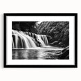 Framed wall art collection showcasing a serene waterfall landscape design, featuring a sleek black frame and white mat, ideal for home decor enhancement.