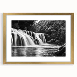 Framed wall art showcasing a serene waterfall landscape in gold matting, perfect for home decor. The vibrant colors and intricate details enhance any room's ambiance.