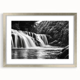 Framed wall art collection showcasing a serene waterfall landscape, featuring silver matting and a sleek frame, ideal for enhancing modern interior decor.