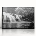 Framed acrylic wall art showcasing a stunning landscape of waterfalls, featuring vibrant blues and greens, with a sleek black frame, perfect for home decor.