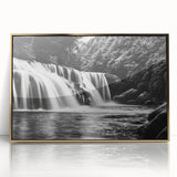 Framed acrylic wall art featuring a stunning landscape of a waterfall, with vibrant colors and a gold frame, perfect for enhancing home decor.