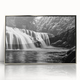 Framed acrylic wall art showcasing a serene waterfall landscape design, accented with silver details, perfect for enhancing modern home decor aesthetics.