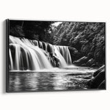 Framed canvas wall art featuring a serene waterfall landscape design, presented with a sleek black frame, ideal for enhancing home decor with nature-inspired aesthetics.
