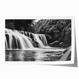 Vibrant landscape print showcasing a serene waterfall surrounded by lush greenery, perfect for home décor. High-quality rolled art piece ideal for framing.