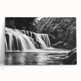 Stretched canvas wall art showcasing a vibrant waterfall landscape with lush greenery, designed to enhance home decor and create a serene ambiance. Perfect for nature lovers seeking to add tranquility to their space.