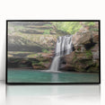 Framed acrylic wall art showcasing a stunning waterfall landscape design, featuring vibrant blues and greens, set in a sleek black frame for modern decor.