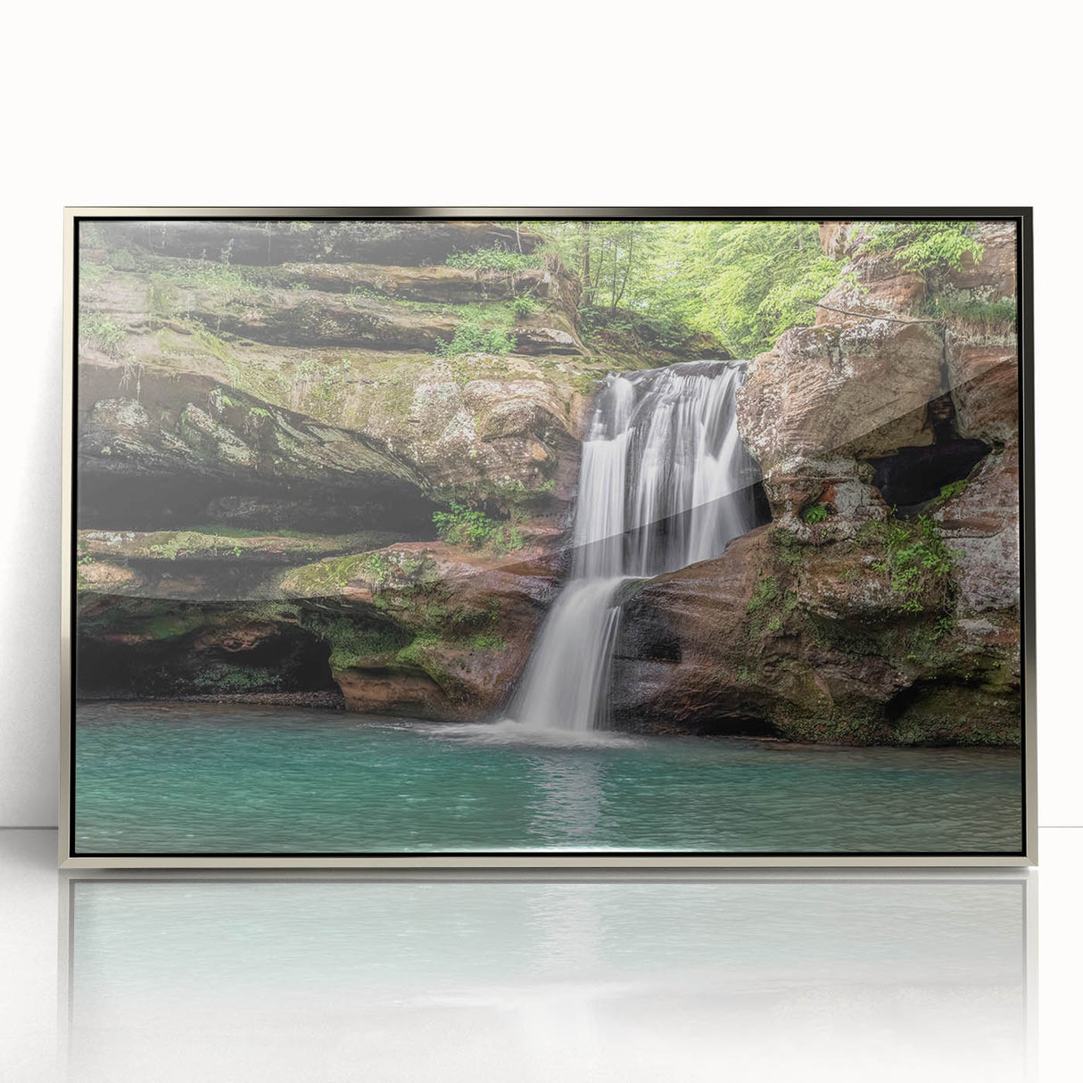 Framed acrylic wall art featuring a stunning landscape waterfall design, showcasing vibrant blues and greens, ideal for enhancing modern home décor.