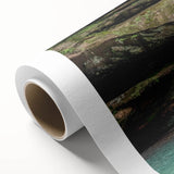 Vibrant rolled canvas artwork depicting a serene landscape with cascading waterfalls, rich greenery, and a tranquil atmosphere, perfect for home decor.